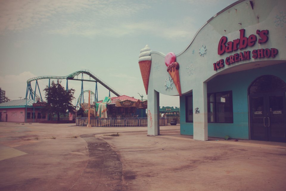 Six Flags, Ice cream shop, carousel and The Jester in the background.   New Orleans East, Louisiana