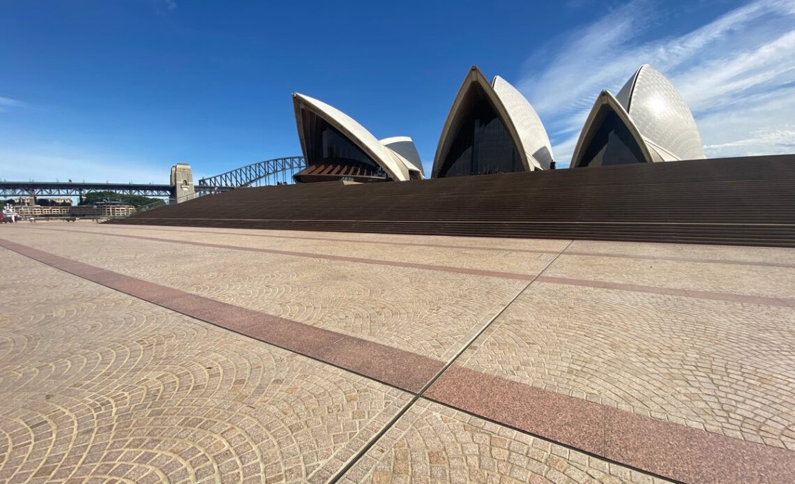 Australia drops Covid vaccination travel rules – but masks on flights remain