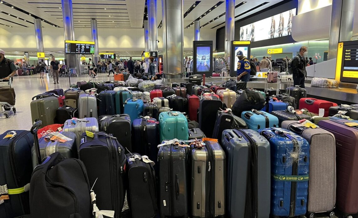 Cancelled flights: Woman spends three hours wading through luggage at Heathrow Airport after being left without clothes for a week