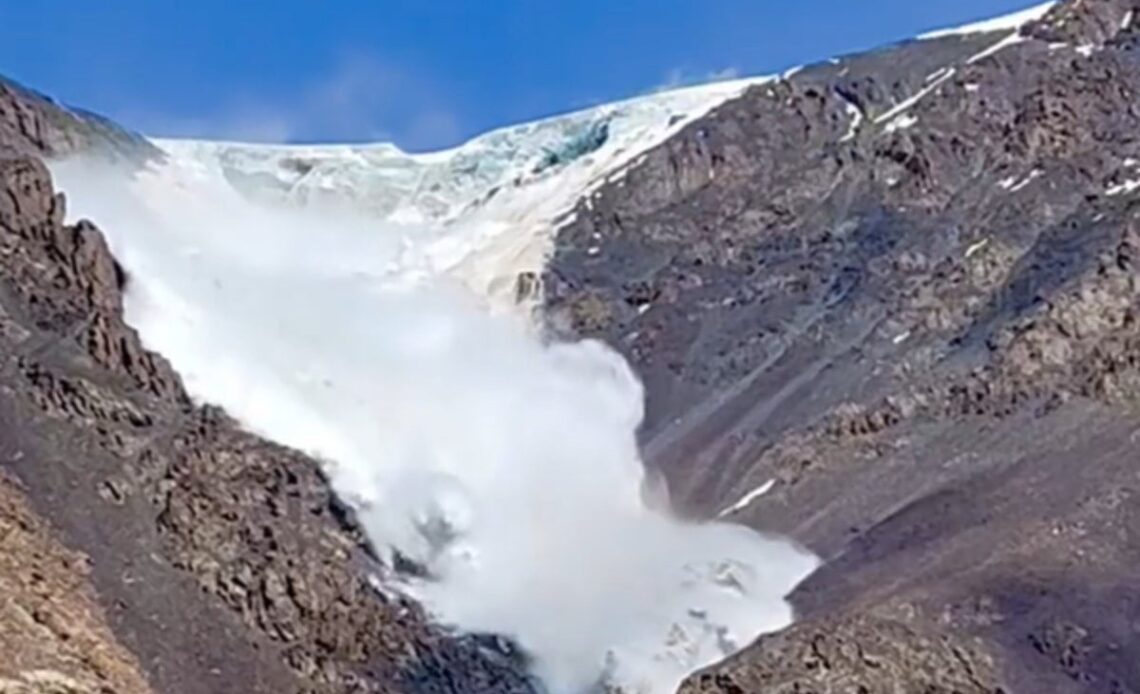 Shocking moment avalanche plunges towards tourists in Kyrgysztan