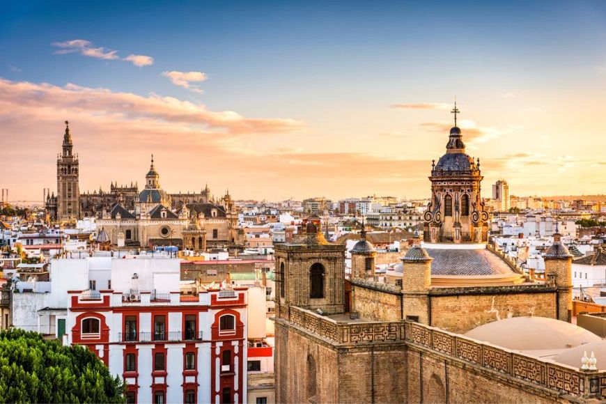 Seville Spain Skyline With Sunset & Buildings