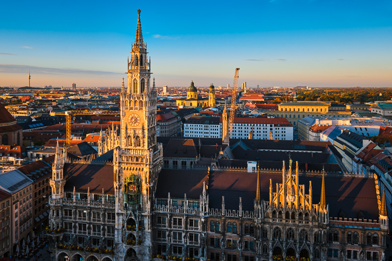 view of Munich: Marienplatz, Neues Rathaus from St. Peter's church on sunset. 