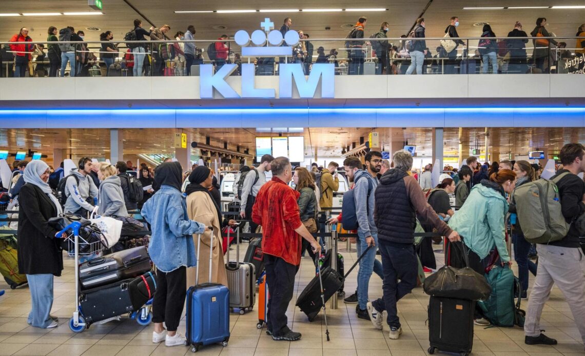 Amsterdam Schiphol to compensate passengers after rough summer