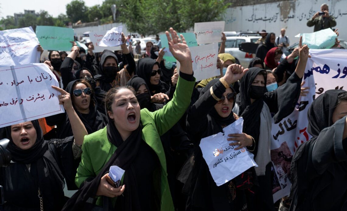 Taliban fighters beat women and fire into air to disperse protesters