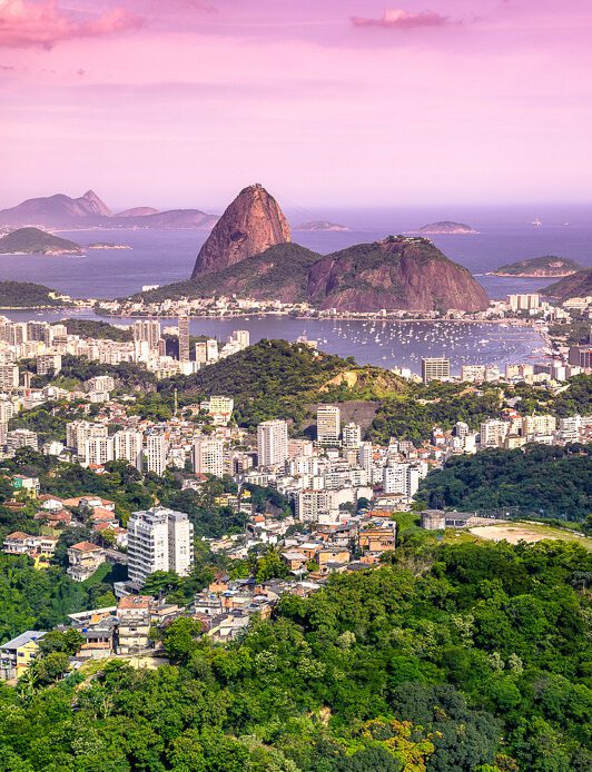 Aerial view of buildings on the beach front with Sugarloaf Mountain in the background, Botafogo, Guanabara Bay, Rio De Janeiro, Brazil