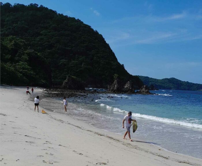 Coastal cleanup participants from Pico de Loro Beach and Country Club and Pico Sands Hotel team members at Santelmo Cove.