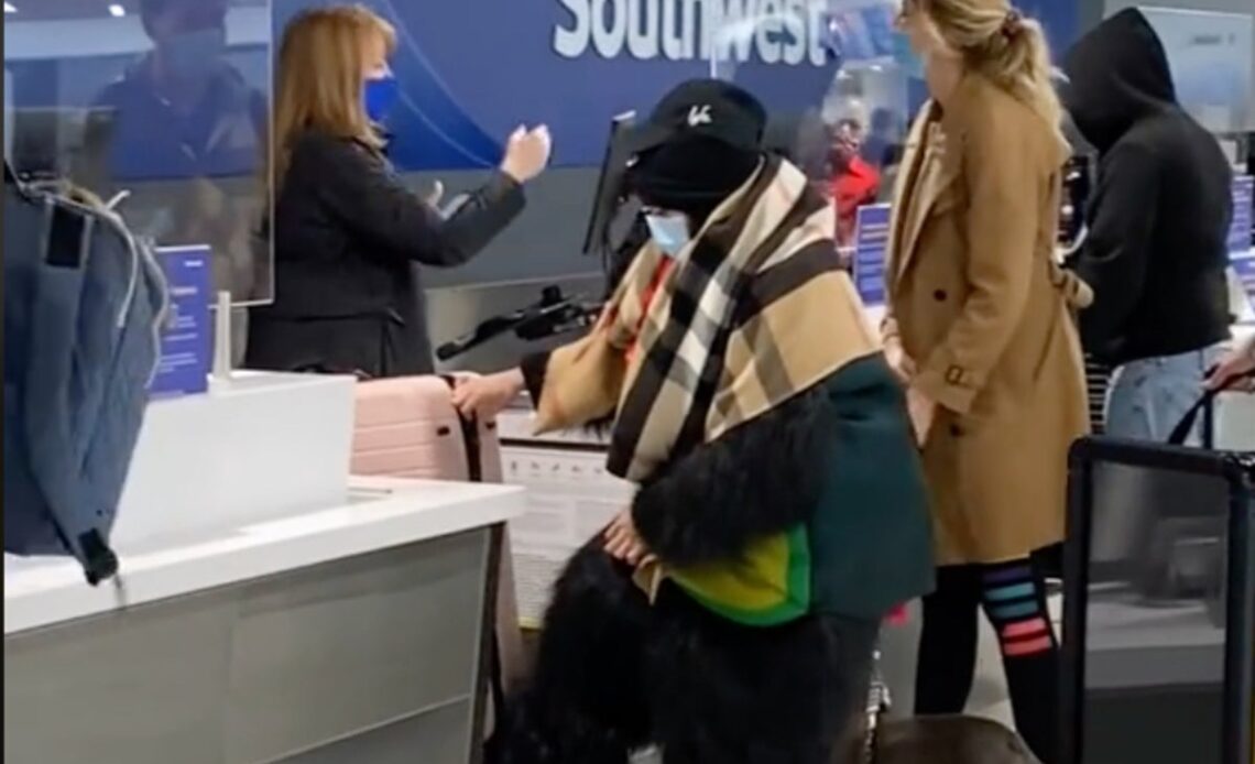 Passengers stunned as woman dons chicken, gorilla and avocado costumes at airport check-in