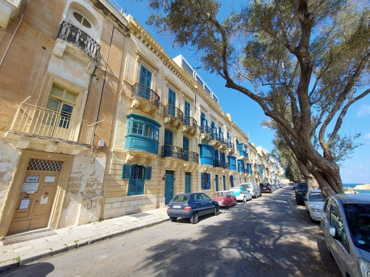 Street parking on one of the larger streets of Valletta, Malta