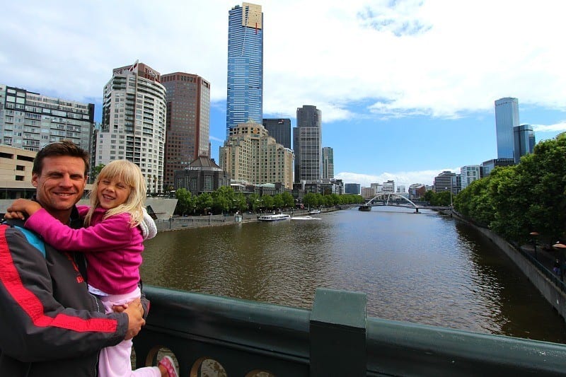 city buildings next to a river