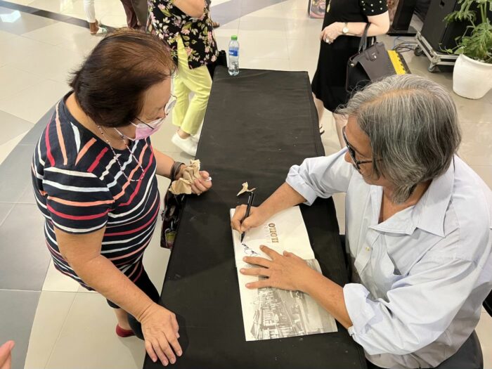 Chef Tibong Jardeleza signing copies of the Cook Book