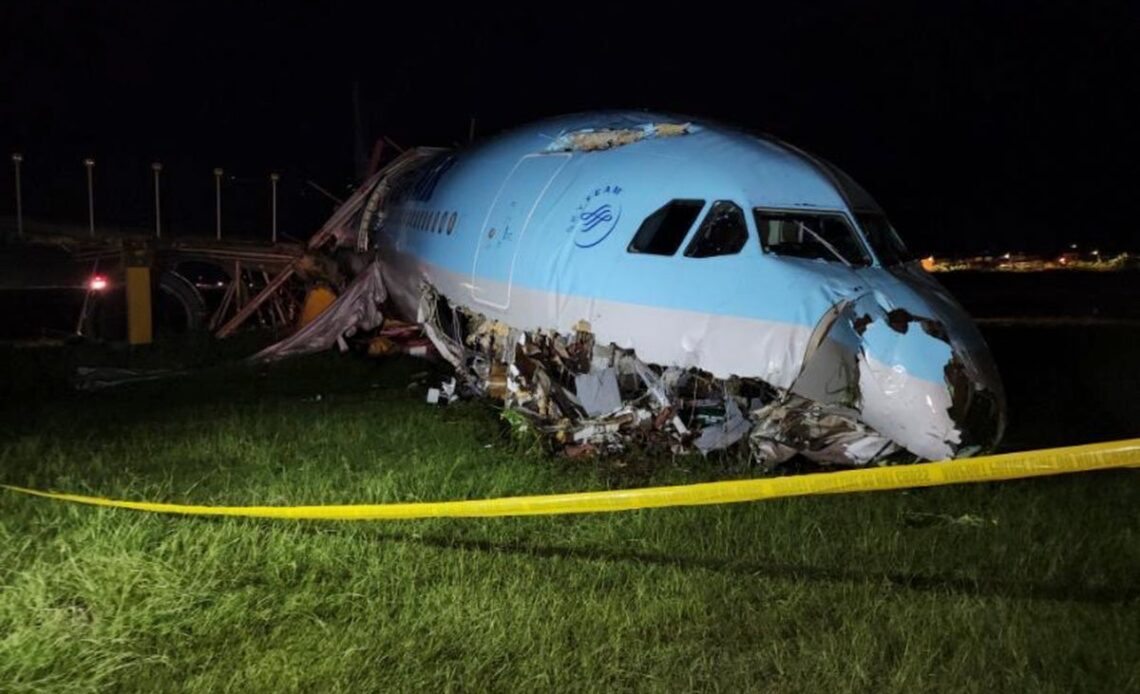 Korean Air flight overshoots runway, leaving plane nose crumpled on ground and forcing airport to close