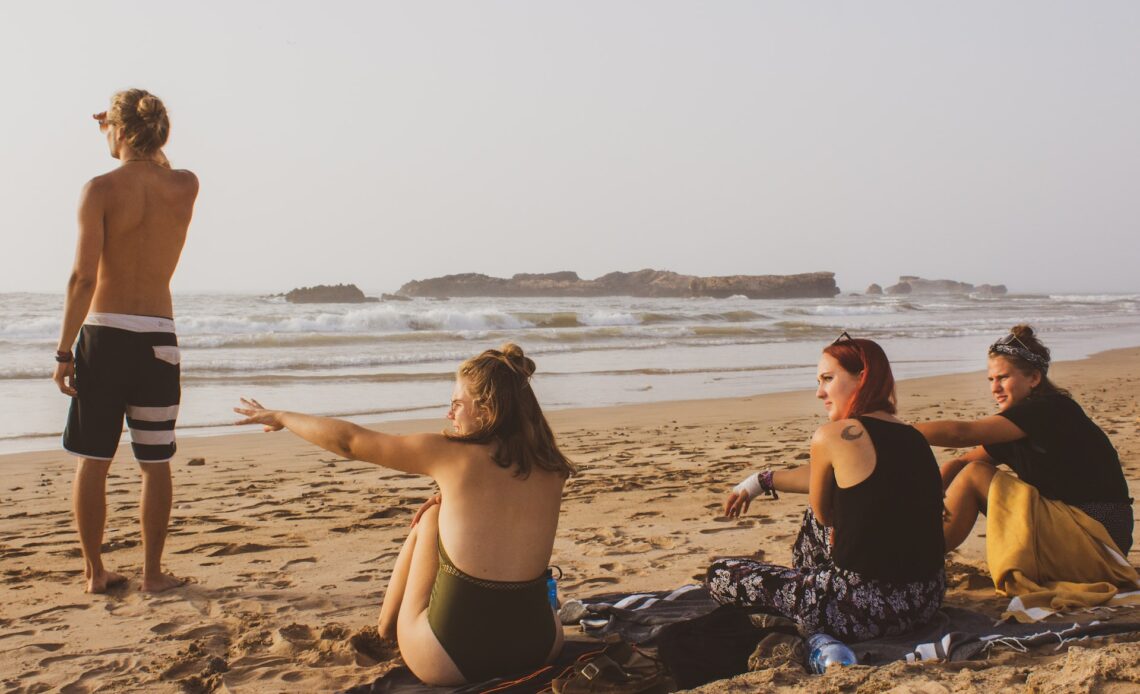 Travelers on a beach in Morocco (photo: Louis Hansel)