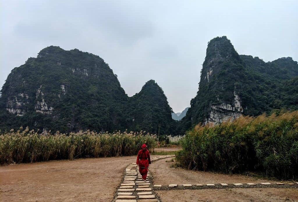 Huge Limestone Cliffs Dominate The Landscape In Ninh Binh