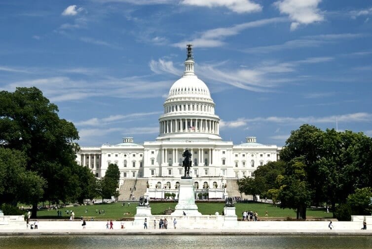 view of captiol hill from across the reflection pool