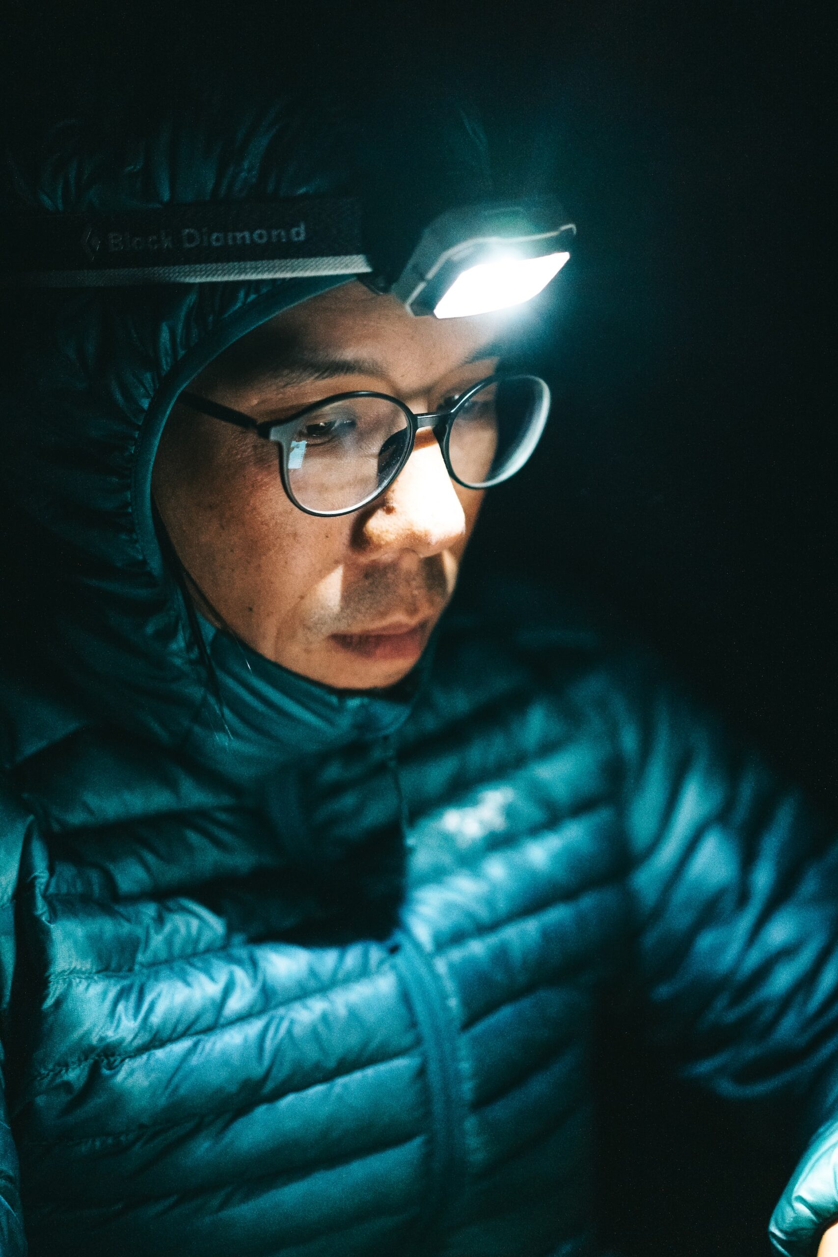 Man using a headlamp (photo: Nick Gosset)