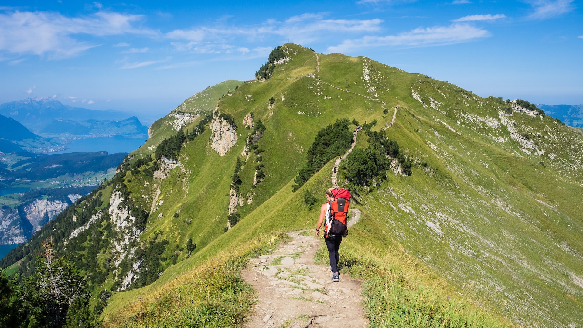 Woman backpacking in Stoos, Switzerland (photo: Ante Hamersmit)