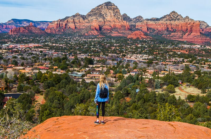 girl staring at red rock mountain view from Airport Mesa Vortex