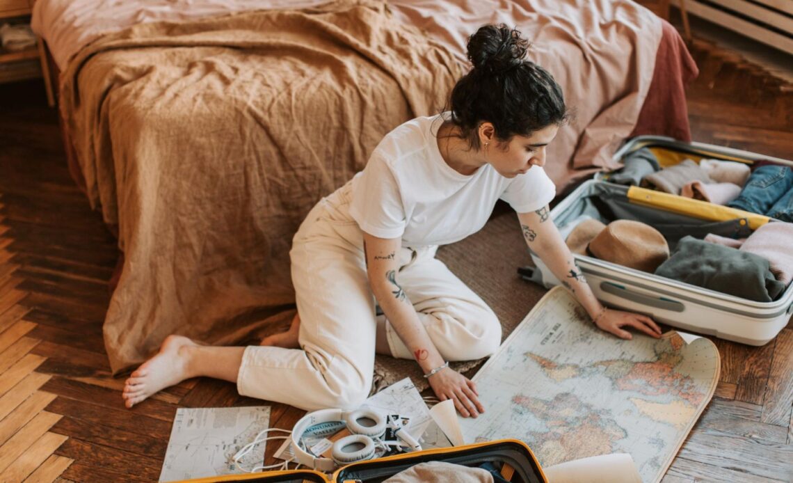 Woman looking at a world map