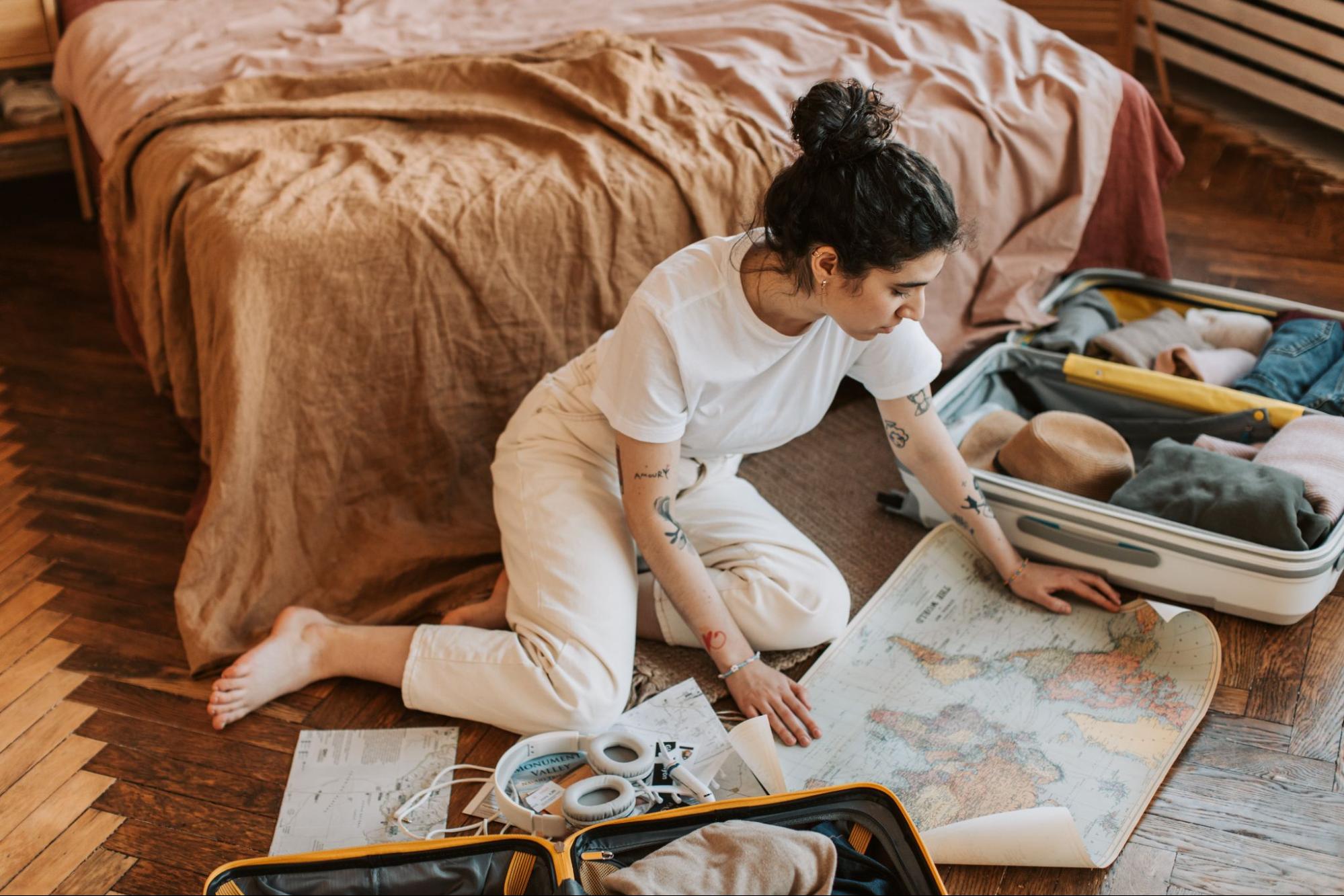 Woman looking at a world map