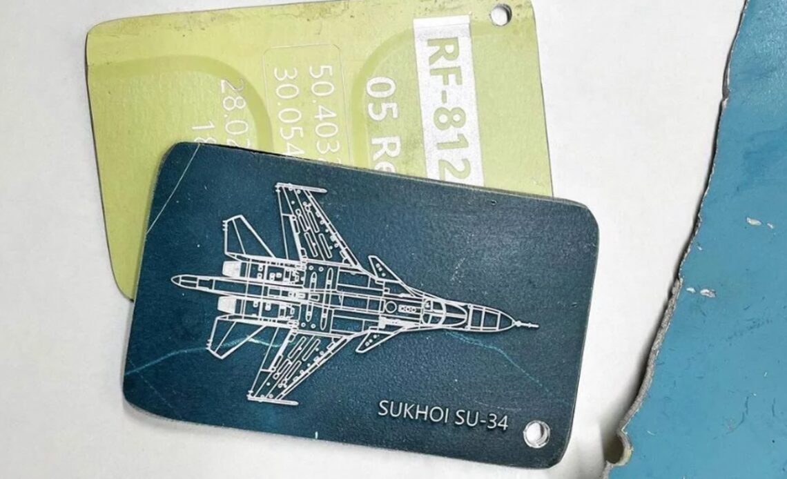 Ukrainians sell luggage tags made from downed Russian planes to fund defence