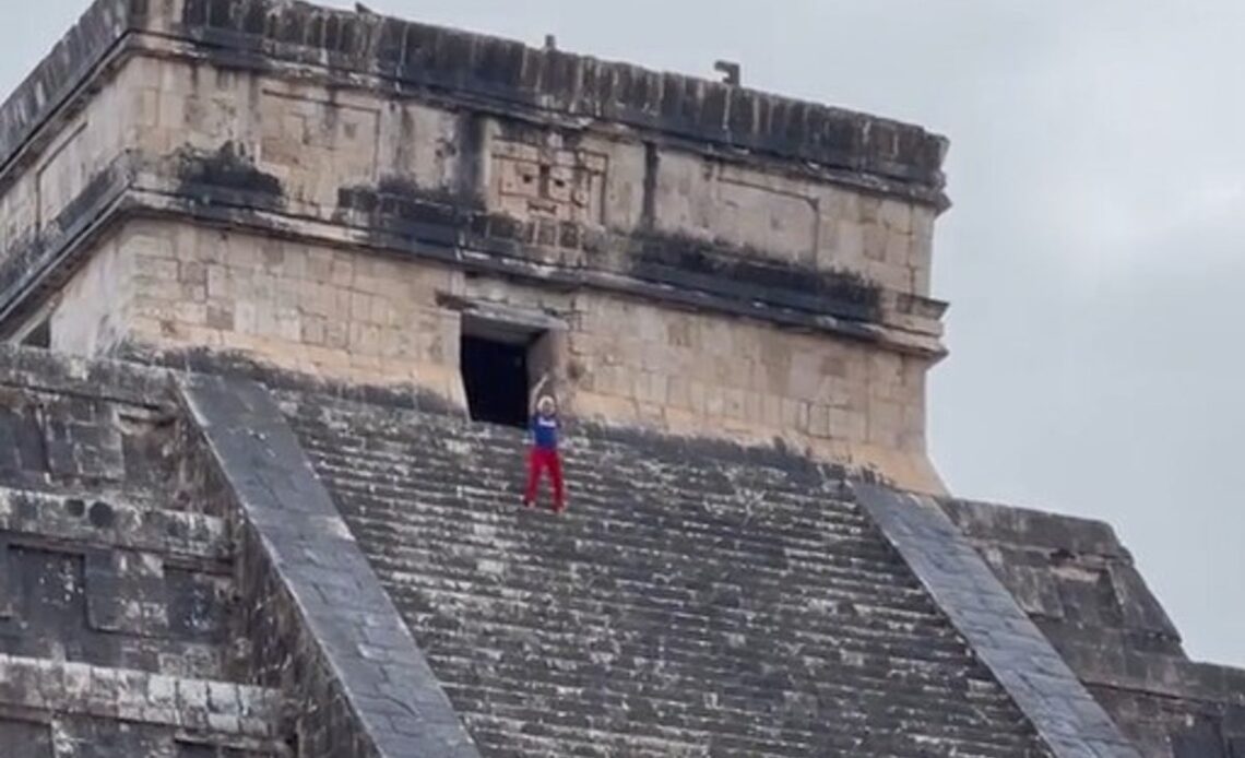 ‘Shame!’: Tourist pelted with water by angry mob after climbing sacred Mayan temple