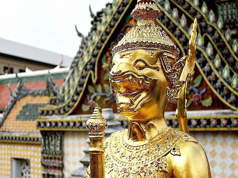 golden statue of god at grand palace