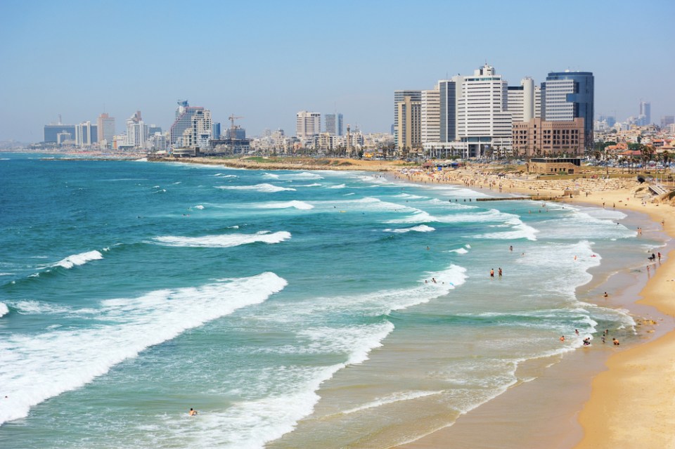 Sea coast and the view of Tel Aviv at the evening