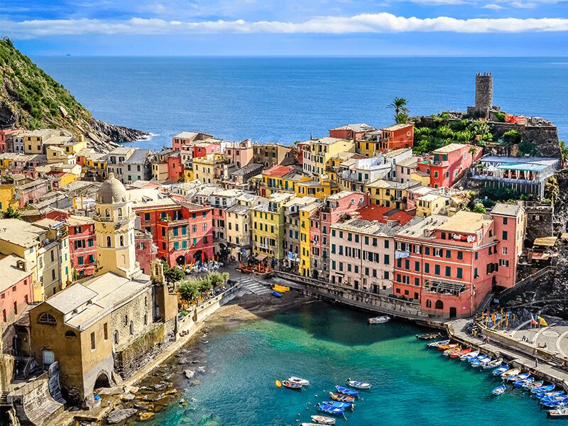 colorful buildings of Riomaggiore on the e12222222dge of the sea