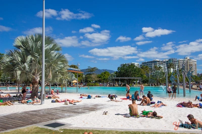 people on the sand at Cairns Lagoon 