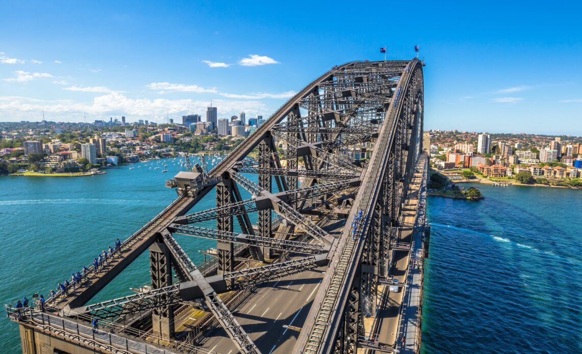 500px Photo ID: 161023355 - Sydney, Australia - December 29, 2014: Harbour Bridge, one of most  photographed landmarks. It's the worlds largest steel arch bridge with the top of the bridge standing 134 meters above harbor