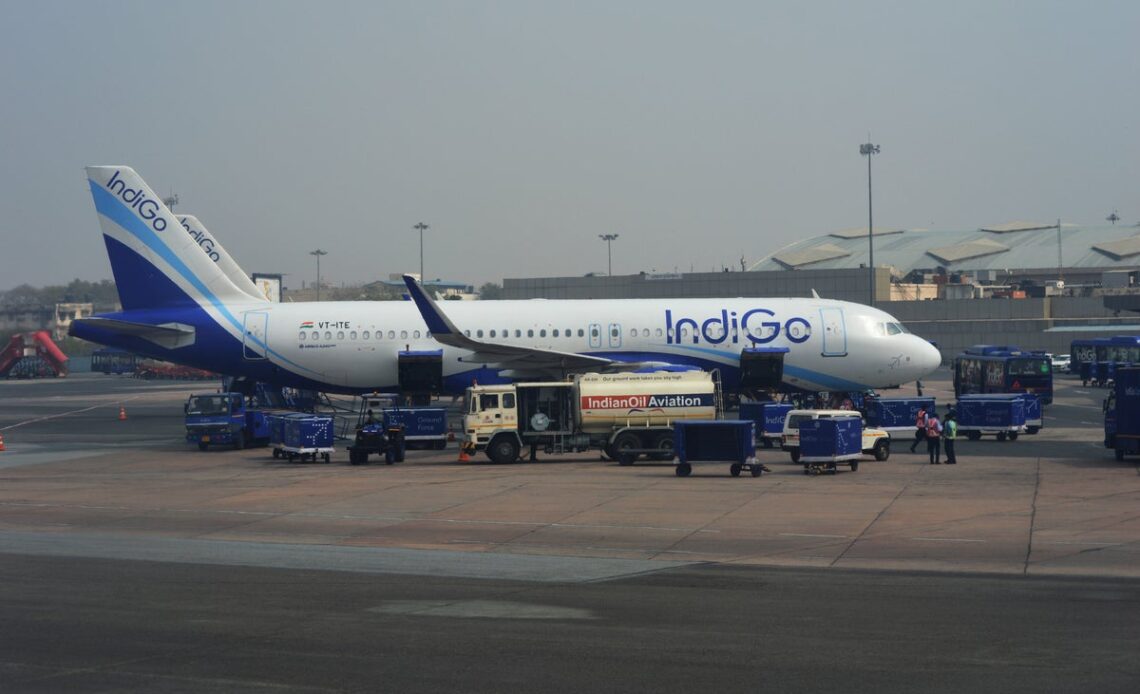 IndiGo passenger tries to remove emergency exit panel mid-flight