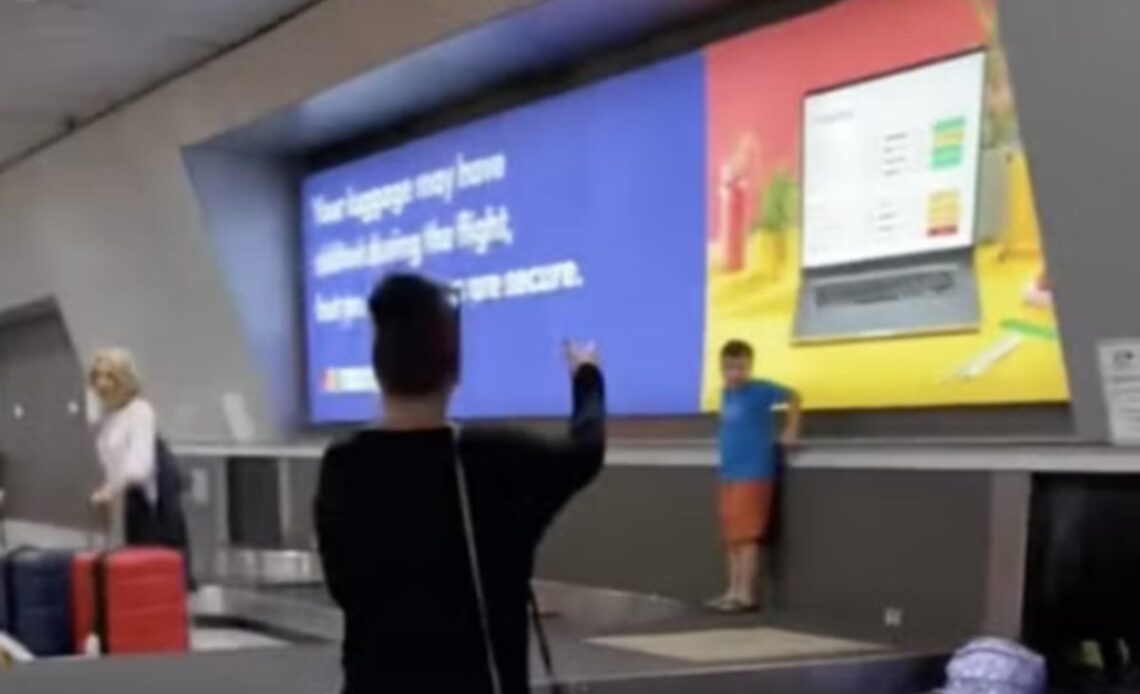 Mischievous child filmed running along baggage carousel at airport