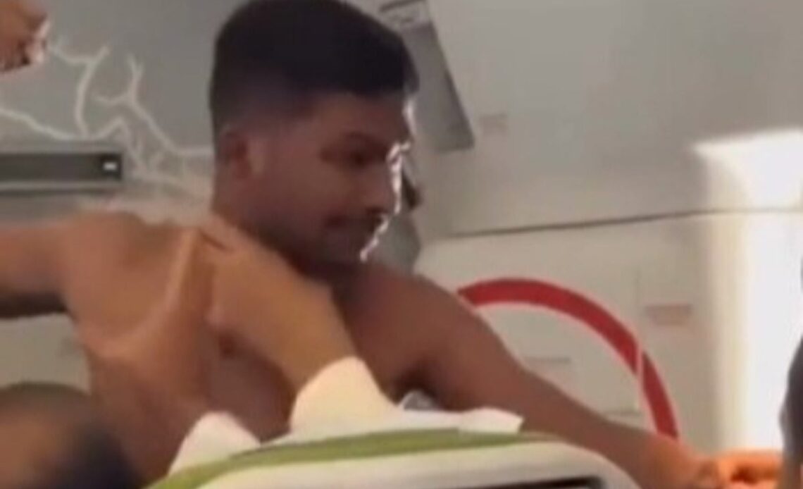 Shirtless man filmed repeatedly punching fellow passenger on flight