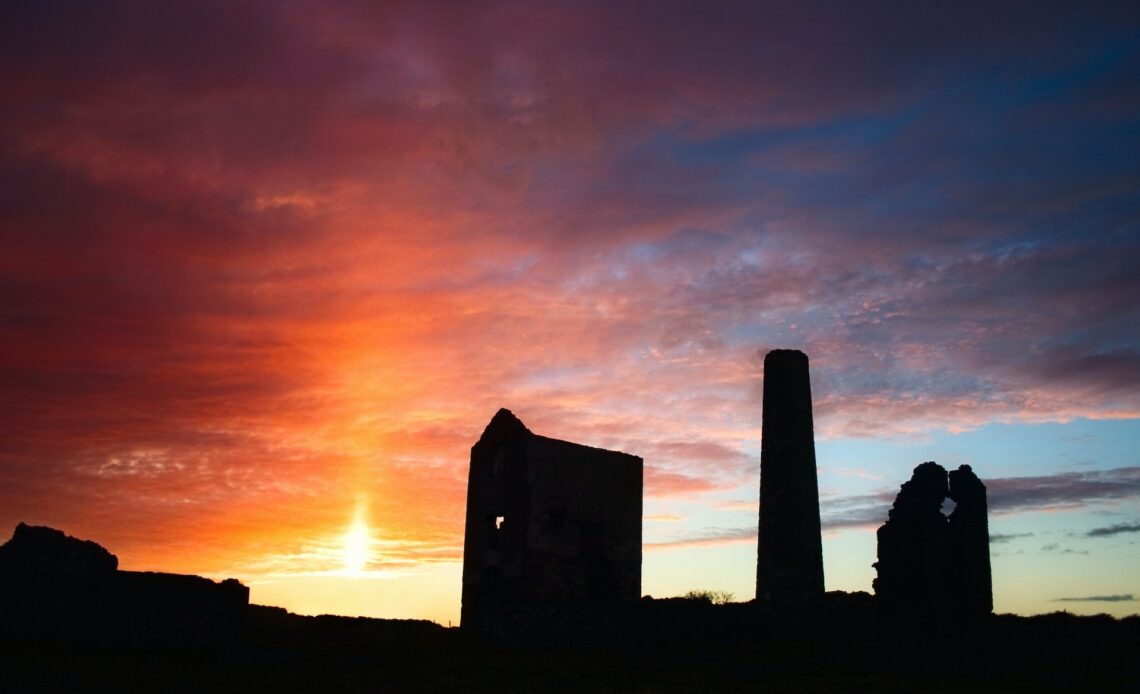 Ruins in front of a colorful sunset