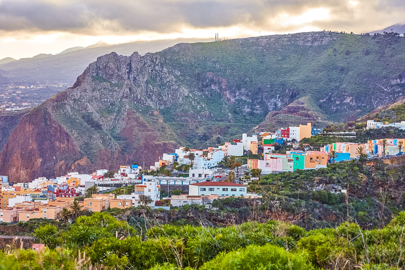 City and mountain view of residential houses or buildings in serene hill valley in Santa Cruz, La Palma, Spain