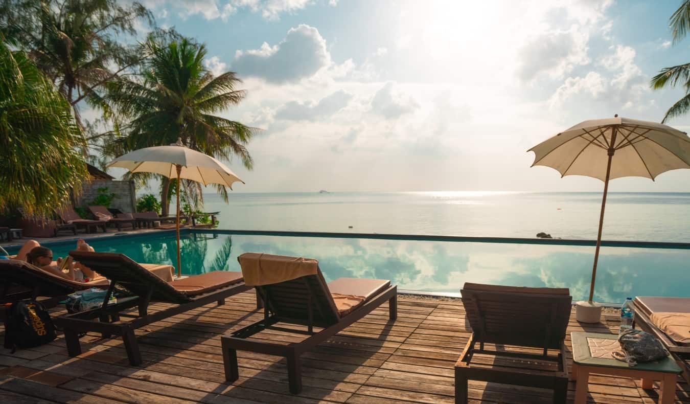 A stunning view at a nice resort by an infinity pool overseas