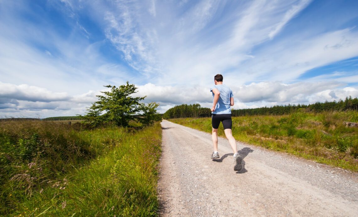 Man running to maintain his fitness routine while traveling (photo: Jenny Hill)