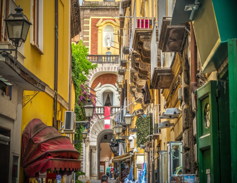 Narrow alley with Duomo in Sorrento, Campania, Italy