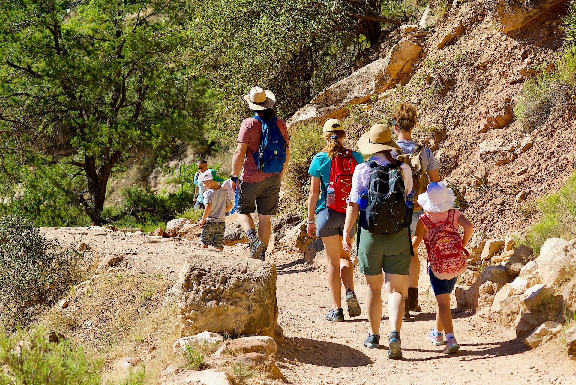 Visitors to Grand Canyon National Park hike the Bright Angel Trail near the South Rim of the Grand Canyon on an excessively hot day