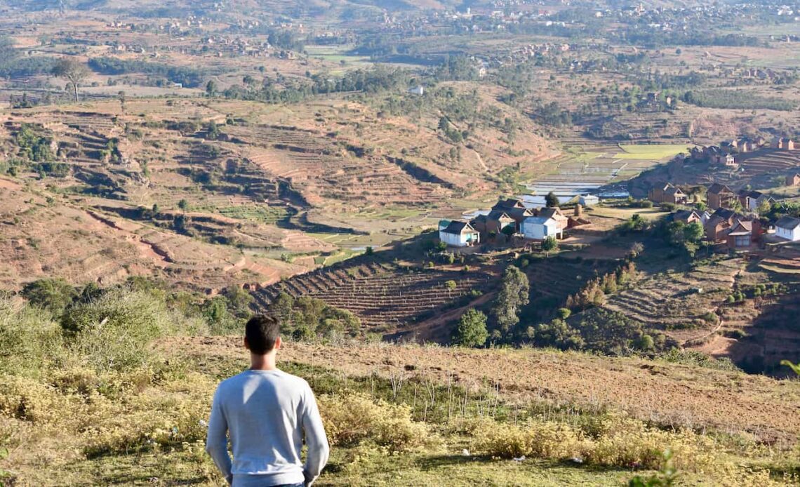 Nomadic Matt staring out over the arid landscape of Madagascar