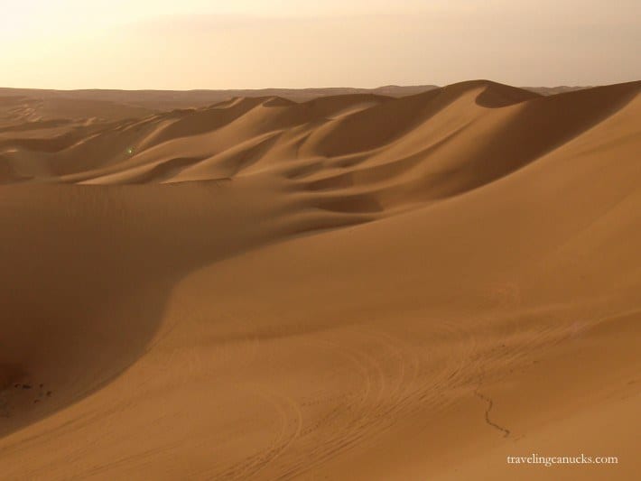 the undulating orange Huacachina Sand dunes Peru