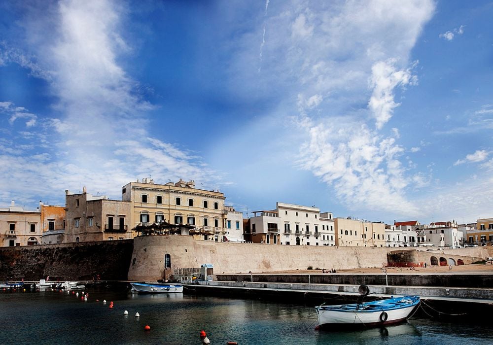 The stunning Centro Storico of Gallipoli, with its narrow alleys and historic buildings, glows with beauty at sunset.