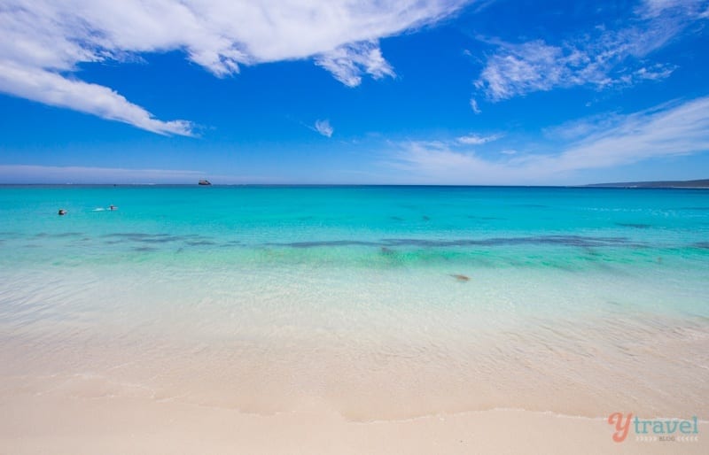 aqua water lapping into shore amlin beach