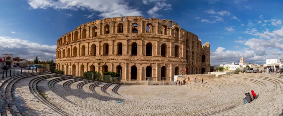 The Roman amphitheater of Thysdrus in El Djem (or El-Jem), a town in Mahdia governorate of Tunisia.The ancient structure has been a World Heritage Site since 1979.