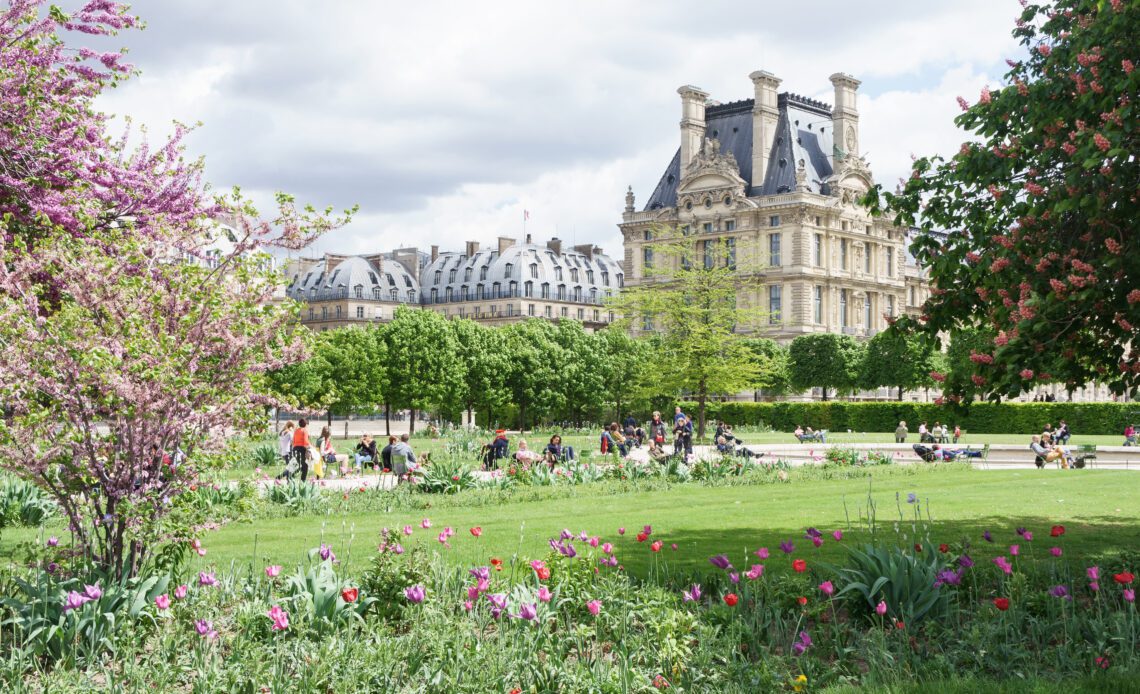 Louvre palace and Tuileries garden view in Paris, France.