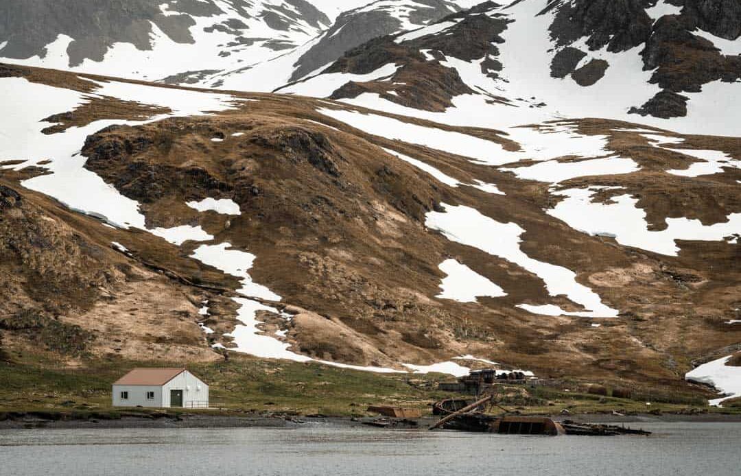 Shack Against Mountains Grytviken South Georgia