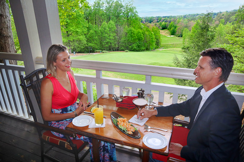 man and woman sitting on balcony having dinner Dinner at Brasstown Valley Resort & Spa