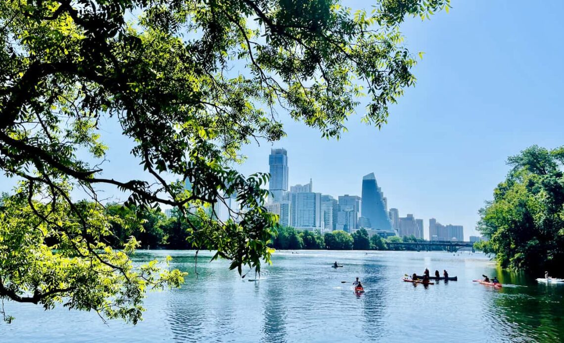 People out enjoying the water on a sunny day in Austin, Texas