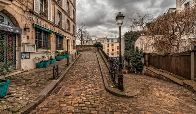 One of the many narrow cobblestone streets near Montmartre, Paris