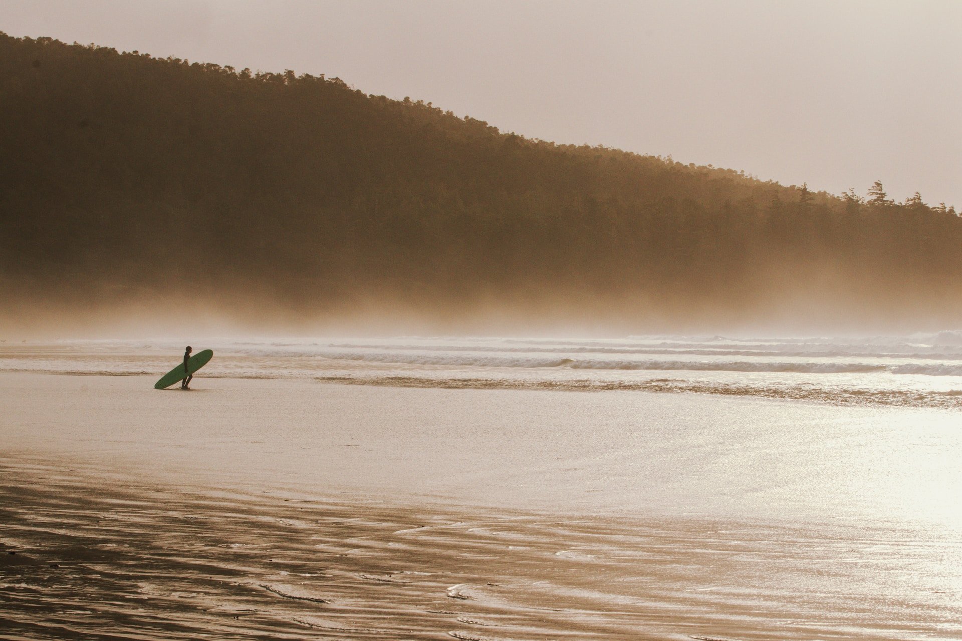 Surfer in Tofino (photo: Micah McKerlich)